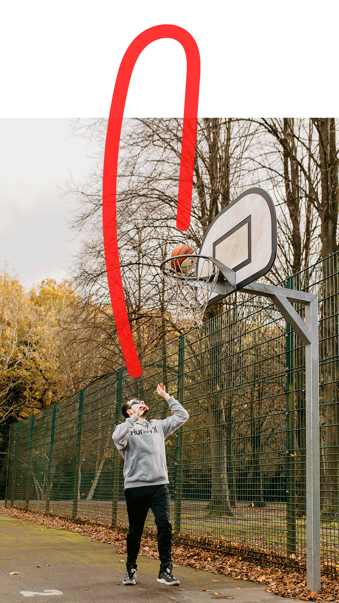 Photo of Niall playing basketball in his local park